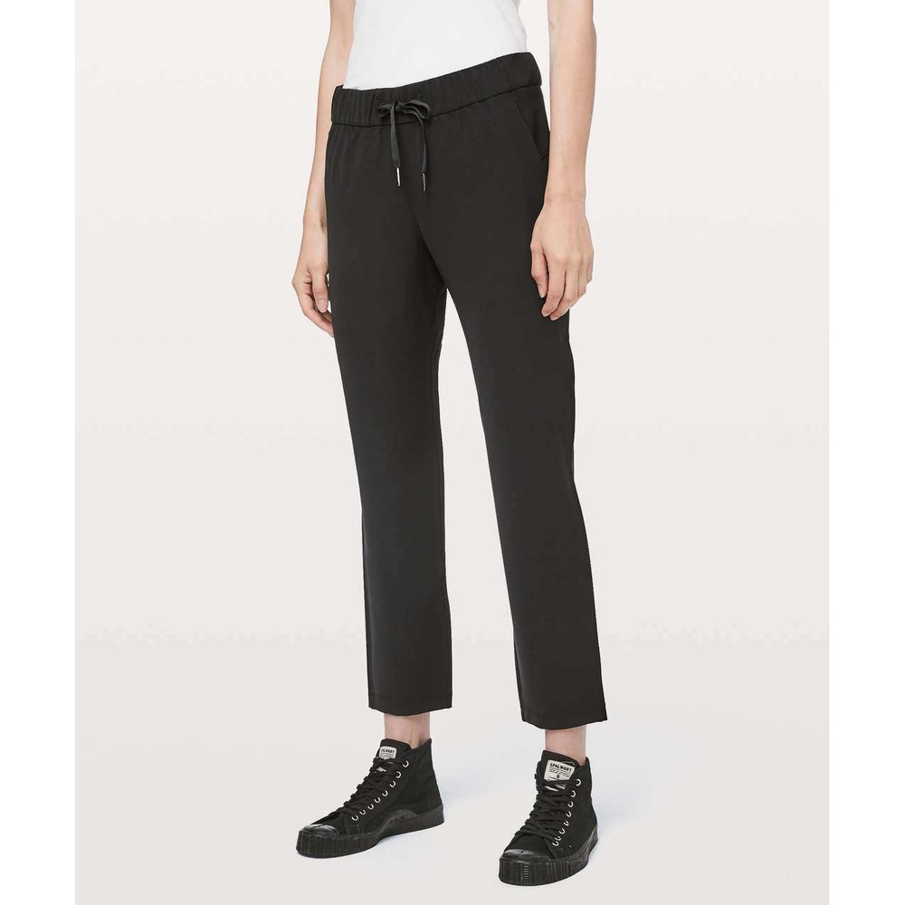 Lululemon On The Fly Pant Size 4 Woven 27" Black Athleisure Training Travel